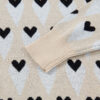 Parchment Geometric Heart Print Ribbed Trim Loose Sweater