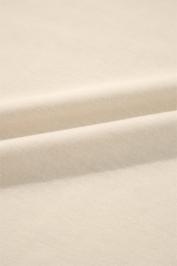 Jet Stream Solid Color Ruffled Shoulder Long Sleeve Blouse