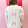 Pink Bow Print Ribbed Trim Exposed Seam Drop Shoulder Loose Sweater