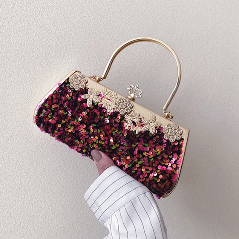 sparkling rhinestone party handbag held by woman
