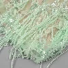 565301440 Beaded fringe light green strapless dress